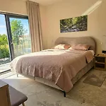 Adistria Vila *